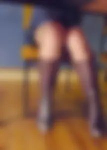 Under table upskirt of a girl wearing pantyhose