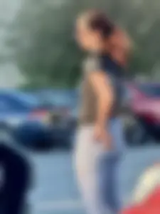 Parking lot MILF rubbing her fat ass
