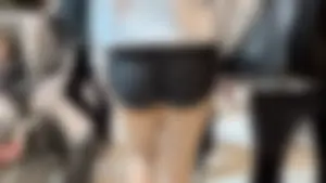 Asian girl in tight black shorts at the mall