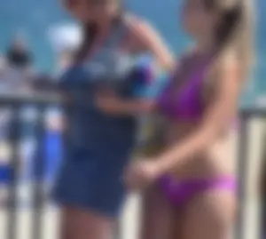 Sexy thick blonde girl in purple bikini