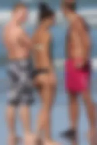 Beach girl out in a bikini with a nice round big booty