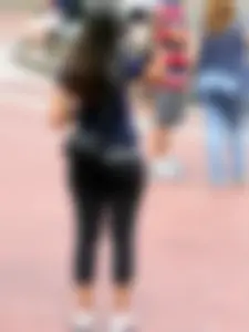 Wide booty brunette tourist in tight leggings