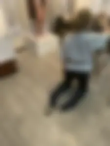 Teen Arts Student Girl Standing On Her Knees While Painting - Feet in Socks And Black Pantyhose