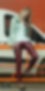 Girl in Red Leather Leggings Sitting on a Street Fence Creepshots Gallery