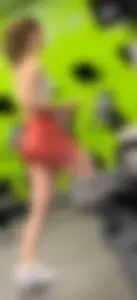 Beautiful girl bending over and spreading legs