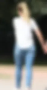 Blonde chick walking with her boyfriend in tight jeans