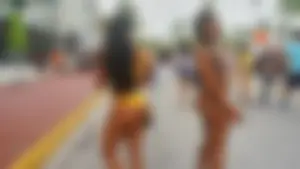 Two sexy ass black girls in thongs posing for the camera