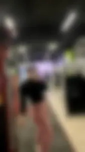 Fit Girl in Yoga Pants Taking Selfies at the Gym