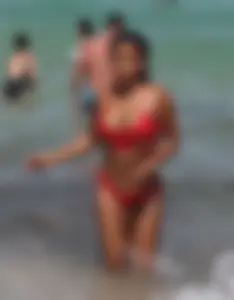 Christina Milian in red bikini in Miami with hard nipples