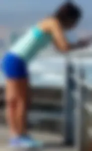 Athletic babe in blue spandex shorts with a nice ass