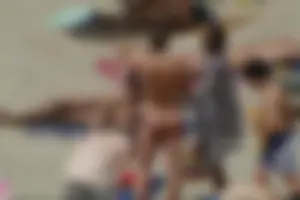 Girls on a nude beach in Sitges, Spain