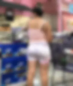 Thick Latina babe with a nice ass in tight patterned shorts