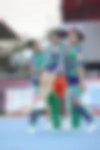 Bunch of athletic Thai cheerleaders at a competition
