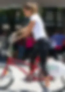 Sexy girl riding a bike in leggings with vtl