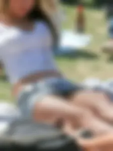 Busty Candid Girl in a Top, Jean Mini-Skirt And Fishnet Pantyhose Sitting on the Ground in the Park, Her Panties Flashing
