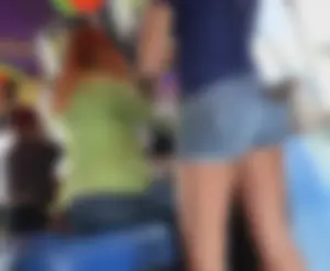 Girl with nice ass at arcade wearing Jean shorts