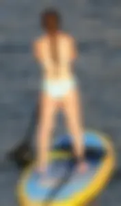 Rowing girl in a bikini with a nice ass