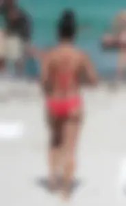 Christina Milian in red bikini in Miami with hard nipples