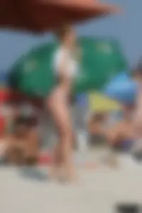 Beach voyeur girls in bikinis, thongs and topless