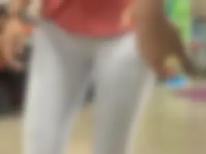 Closeup of a ladies crotch and booty in white leggings