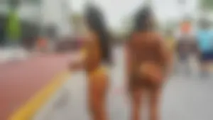 Two sexy ass black girls in thongs posing for the camera