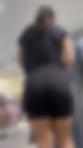 Girl Wearing Black Top And Tight Black Shorts (Upshots)