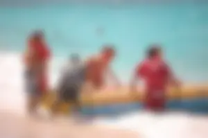 Assortment of sexy babes at the beach in bikinis