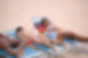 Assortment of sexy babes at the beach in bikinis