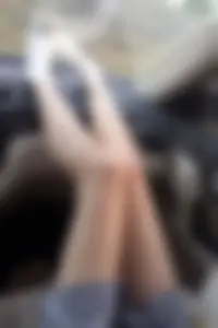 Skinny Legs in White Socks in the Car Photos
