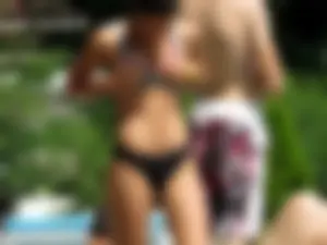 Hot ass girl in a thong bikini at the pool
