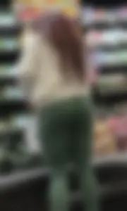 Ebony with a DEEP WEDGIE  in Green Leggings