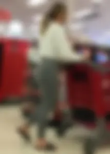 Sexy lady shopping at Target with a big ass in grey leggings