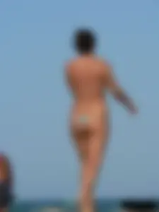 2 topless thonged sexy friends on the beach with great bodies