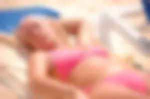 Assortment of sexy babes at the beach in bikinis