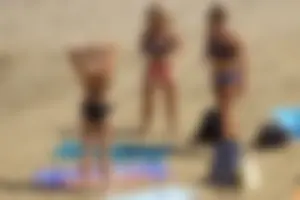 Sexy mix of girls in bikinis at the beach