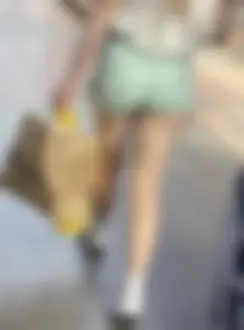 Sexy blonde in green shorts