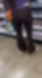 Brunette in maroon flare leggings
