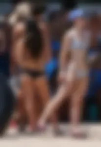 Girls in bikinis getting ready for tubing