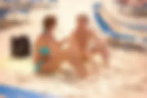 Assortment of sexy babes at the beach in bikinis