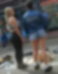 Hot Teen Blonde in a Top and Yoga Pants Playing Guitar on the City Street Candid Archive