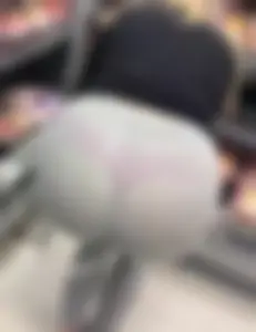 Sexy blonde in grey see through leggings showing her red thong