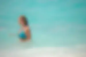 Assortment of sexy babes at the beach in bikinis