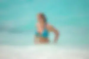 Assortment of sexy babes at the beach in bikinis