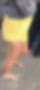 Skinny ass eating her yellow shorts