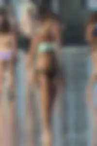 Beach girl out in a bikini with a nice round big booty