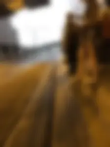 Cute Teen in Shorts on the Tram Stop