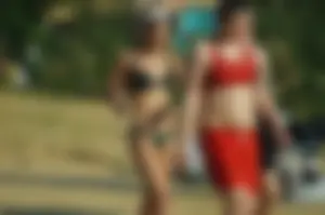 Group of Girls in Swimsuits Walking on the Beach Candid Photo Gallery