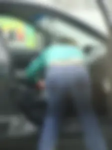Girls cleaning their cars in jeans and pants