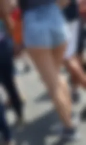 Thick booty babe in denim shorts showing her cheeks