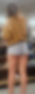 Cute girl showing cheeks off at the thrift shop